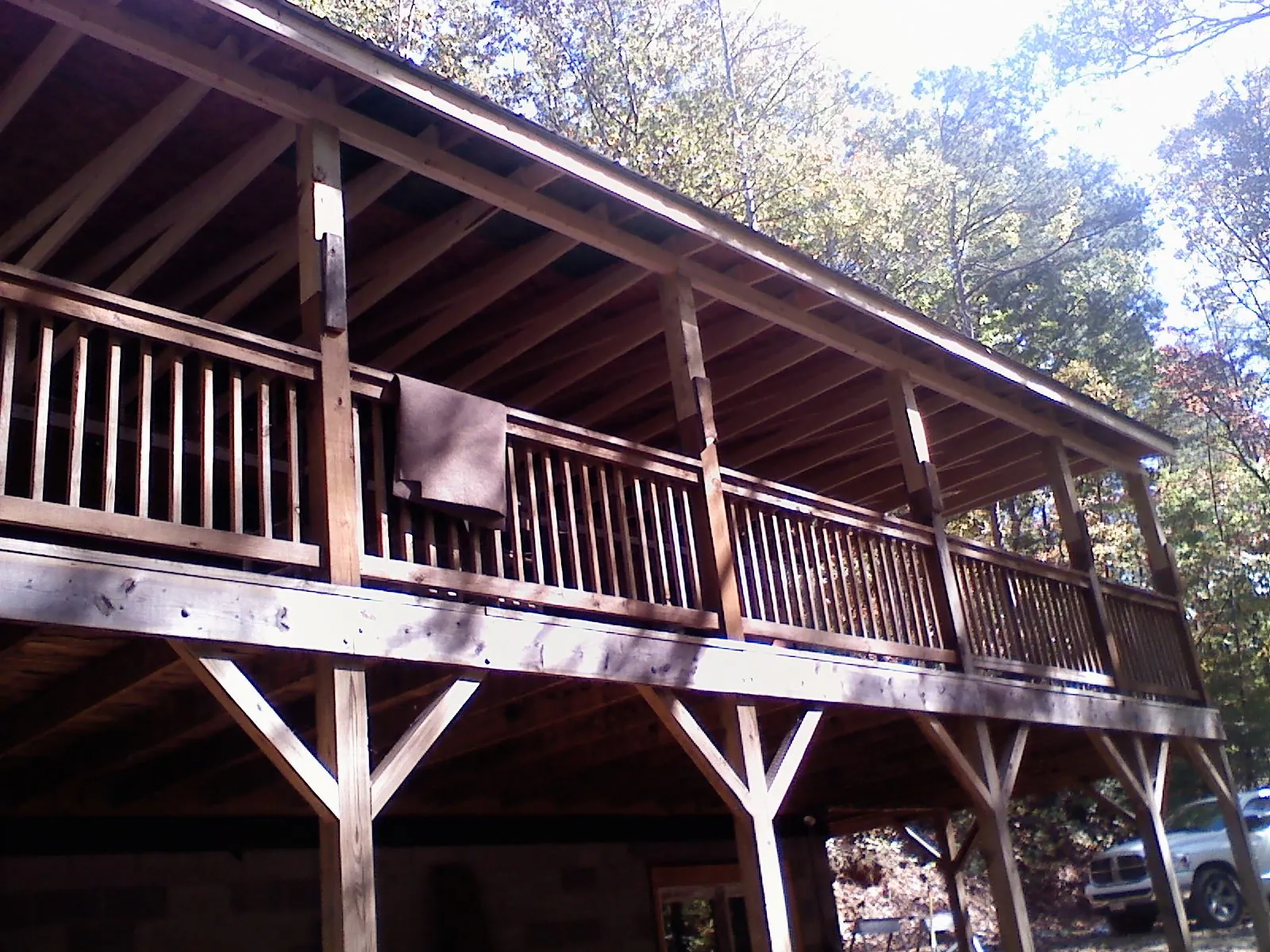 Timber framing under a new elevated porch and deck — Roof Leak Repair in Forest Lakes by Roofing Brothers